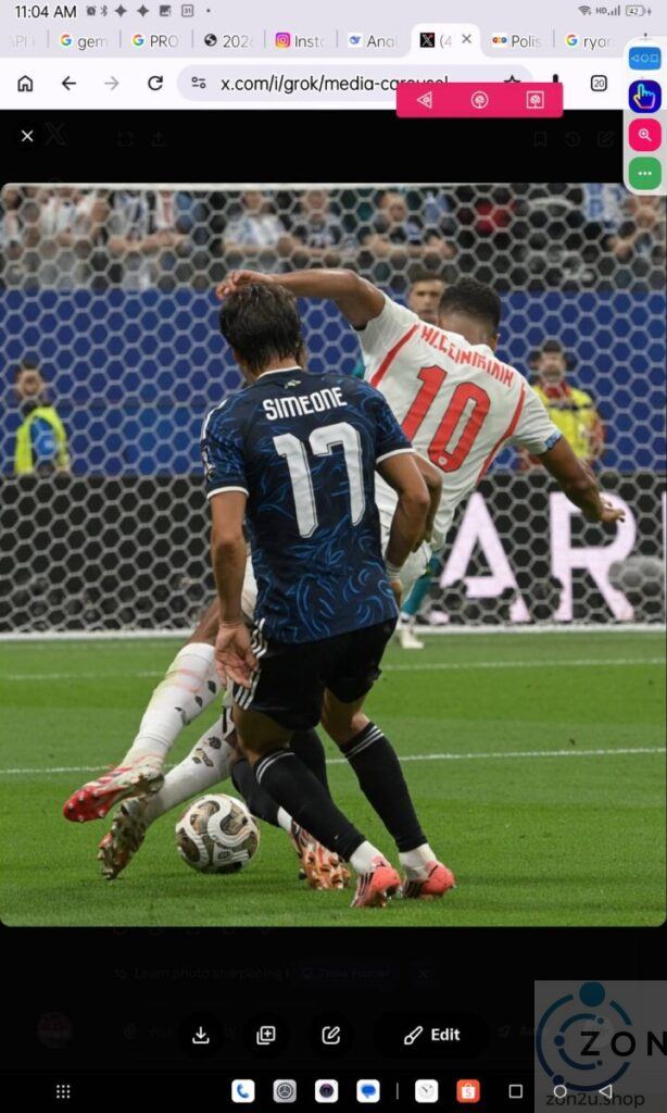 Giovanni Simeone, wearing a blue jersey with number 17, battles for the ball against an opponent in a white jersey